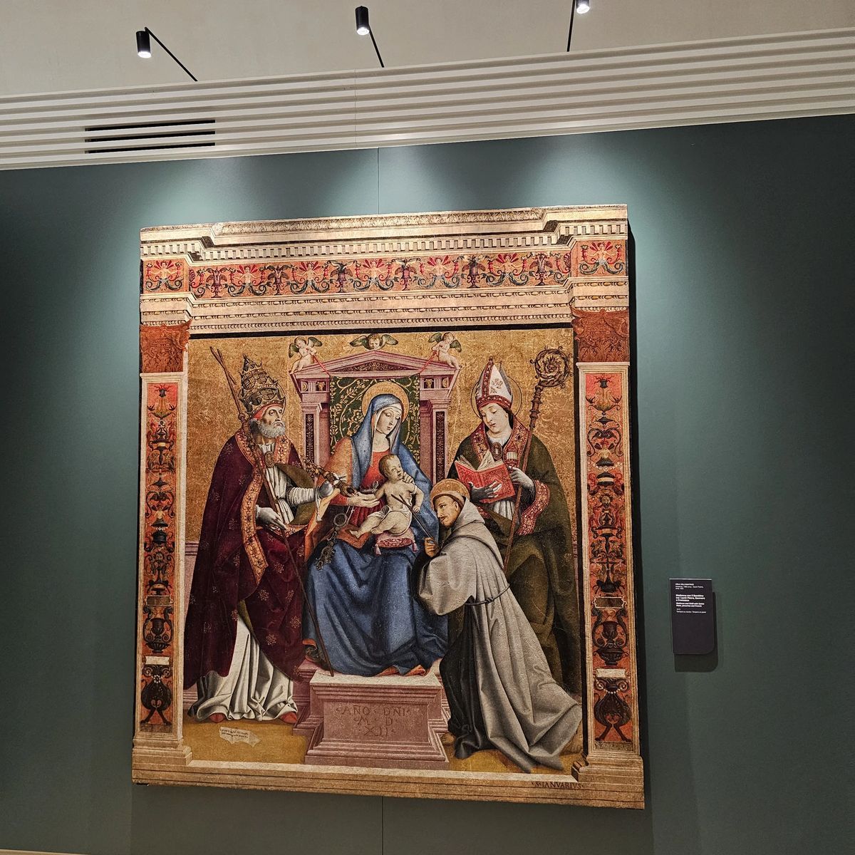 Cola dell'Amatrice, Madonna con il Bambino tra i santi Pietro, Gennaro e Francesco